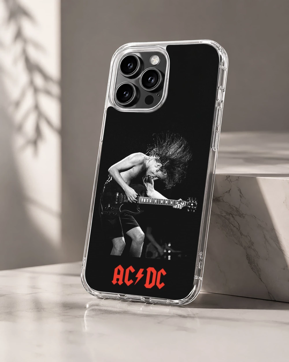AC DC phone case for iPhone 16 Pro featuring a rock guitarist